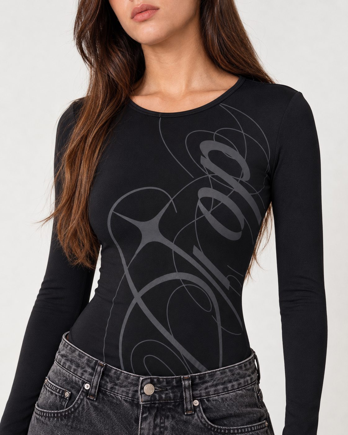 Close-up of the Nikita Bodysuit front graphic