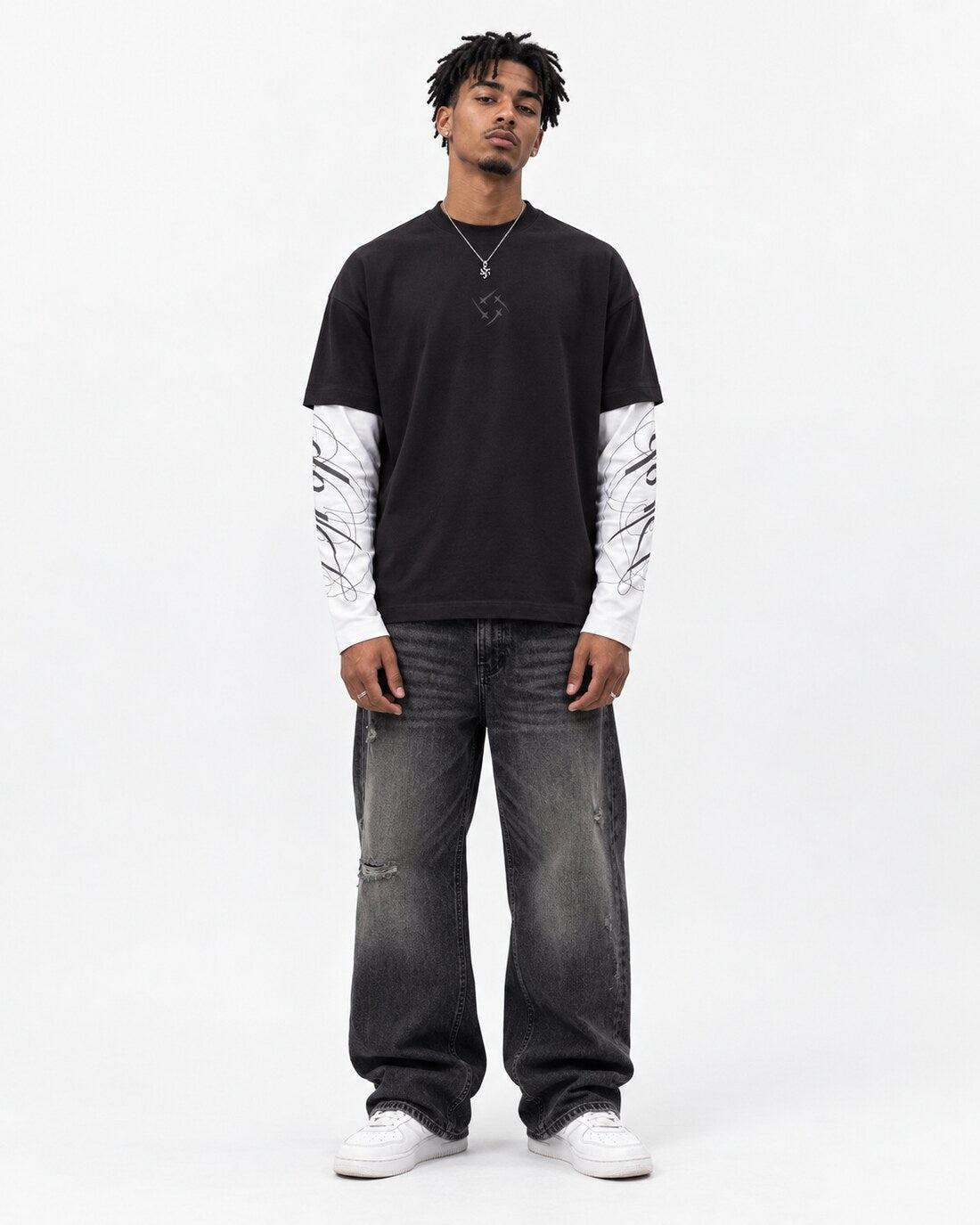 Heritage Long Sleeve — front view on model, layered black tee over white drop sleeves