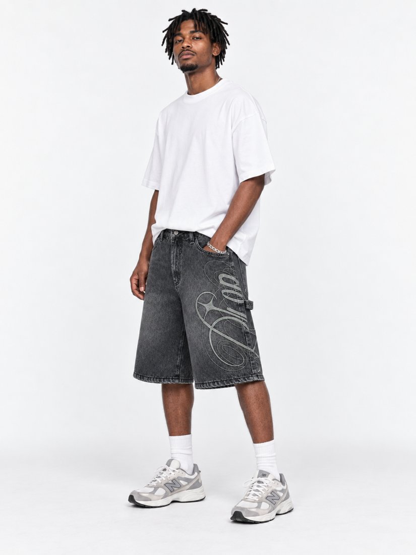 Exhibit 001 Jorts — three-quarter view on model showing script graphic